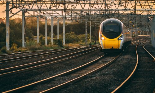 Pendolino passes as the sun set in the background